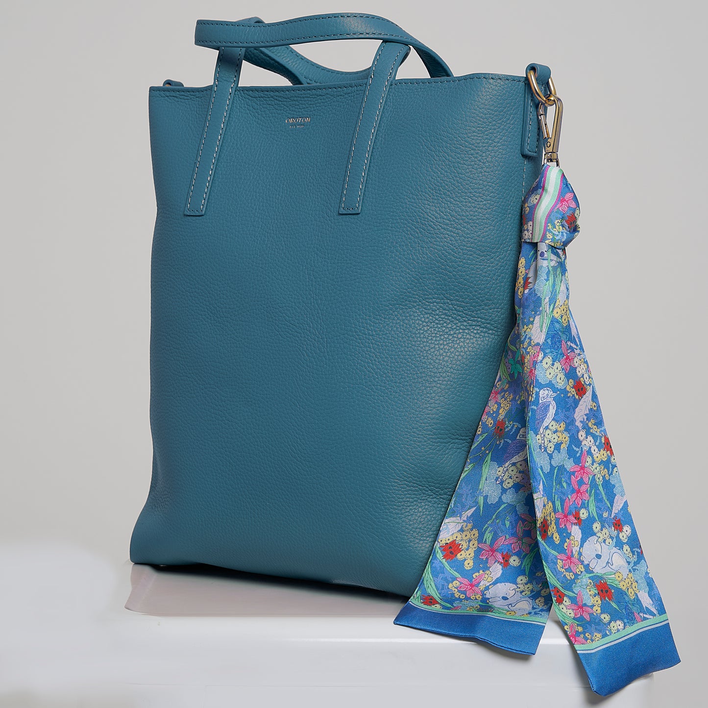 Among the gums Blue bag charm